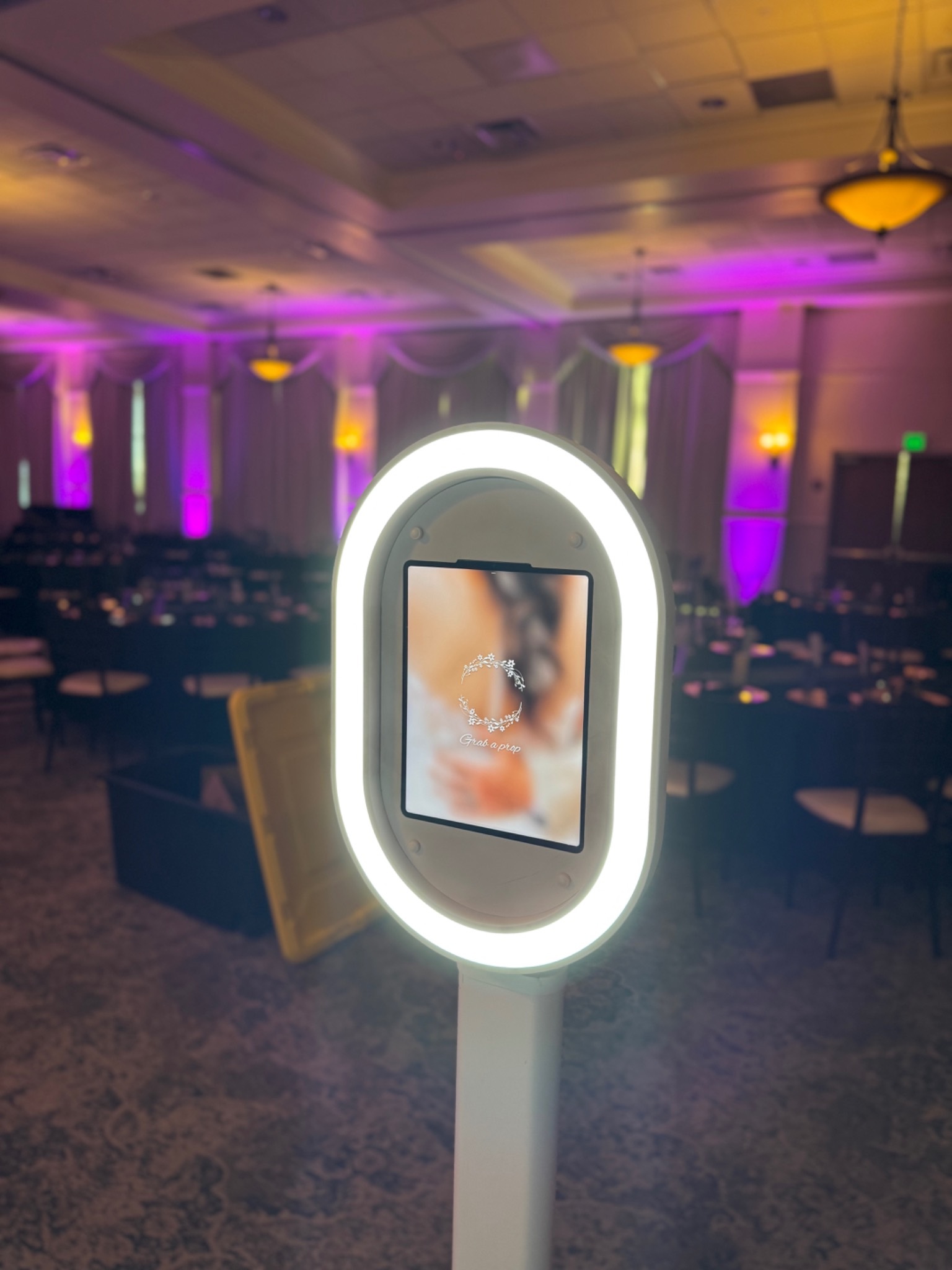 BOMBA digital photo booth illuminated at an event