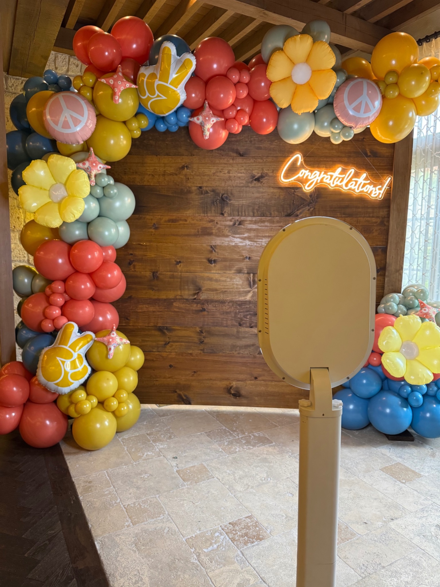 Digital photo booth setup at a colorful celebration in Orlando